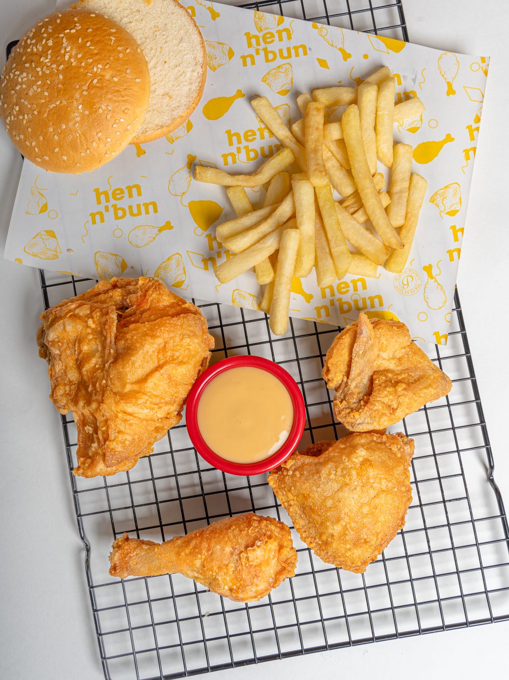 Half broast with fries, bun and garlic dip
